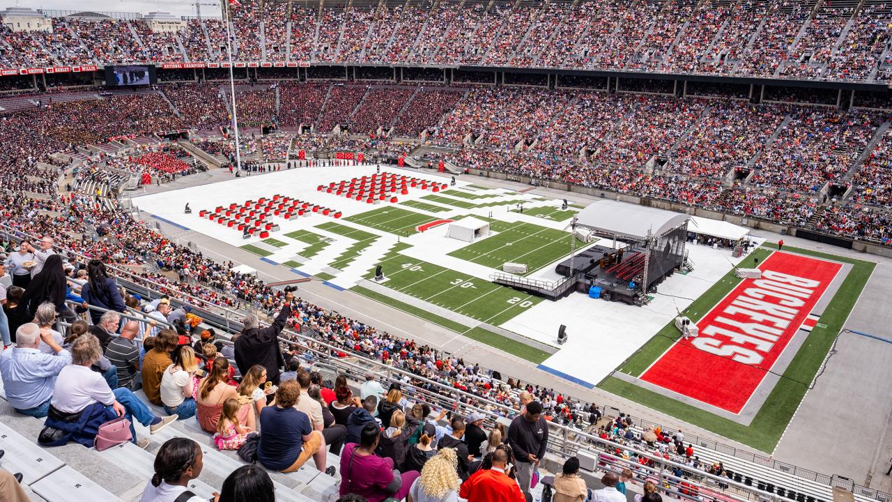 Family members in the Ohio Stadium stands during commencement